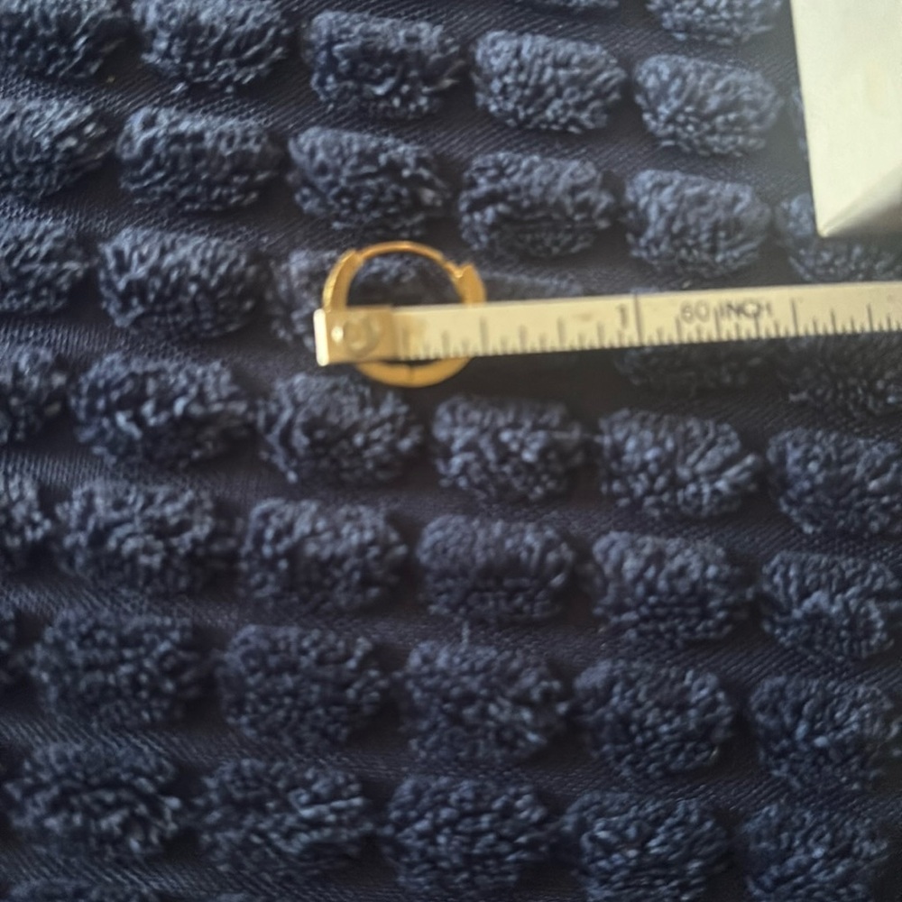Beveled design gold hoop earring 
14k gold one half inch in diameter never worn
